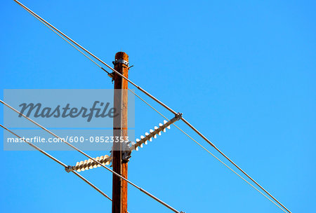 Hydro wires against blue sky, Canada