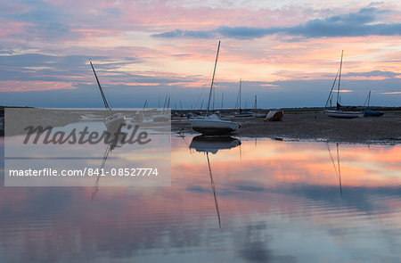 A beautiful sunset at low tide at Brancaster Staithe, Norfolk, England, United Kingdom, Europe