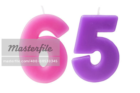 Colorful birthday candles in the form of the number 65 on white background