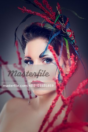 Beautiful woman. Cosplay style with bright creative hair. Art beauty image. Portrait shot in the studio