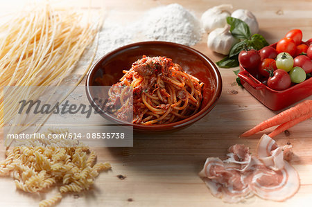 High angle view of spaghetti with parma ham sauce in bowl
