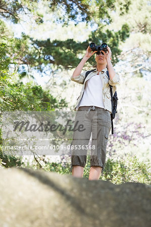 Woman using binoculars