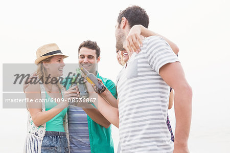 Group of friends having a beer