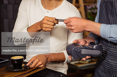 Man paying coffee