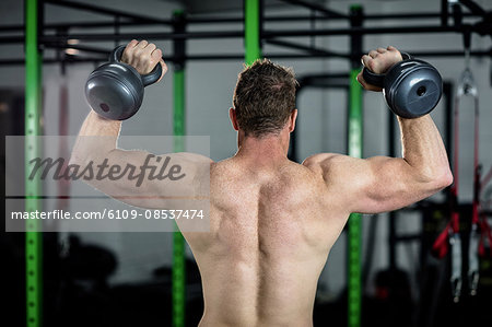 Man exercising with kettlebell