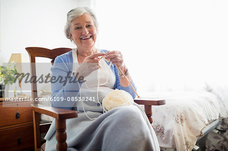 Senior woman knitting