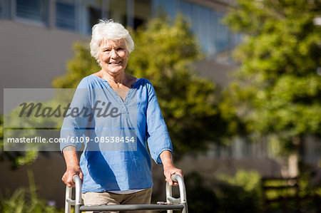 Senior woman posing with her Zimmer Frame