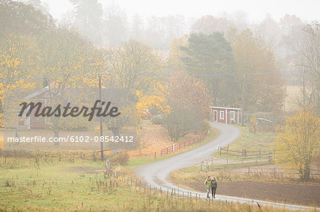 Young couple on rural road