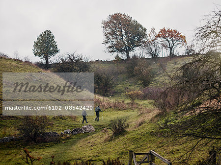 Young couple hiking on overcast day