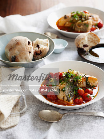 Sicilian monkfish stew and bread rolls