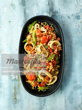 Zesty Sicilian squid, cherry tomatoes, green beans, couscous, red pepper