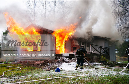 Fire fighter fighting fire Fire fighter fighting fire