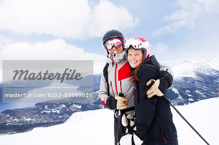 Portrait of smiling couple skiing