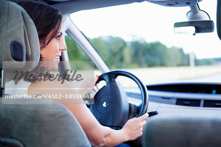 Woman driving a car, Sweden.
