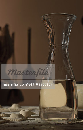 Pitcher of water with pasta dough