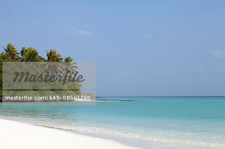 Waves washing up on tropical beach