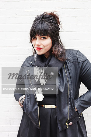 Portrait of a woman wearing leather jacket