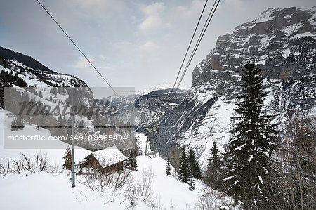 Wooden chalet,and cable wires, Schilthorn, Murren, Bernese Oberland, Switzerland Wooden chalet,and cable wires, Schilthorn, Murren, Bernese Oberland, Switzerland
