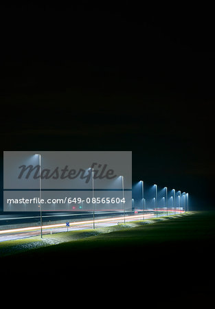 Night shot of new road build on land reclaimed from sea, Rotterdam harbor, Massvlakte, Rotterdam, Netherlands