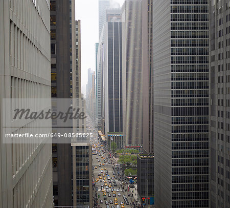 Elevated view of rush hour between skyscrapers, New York, USA