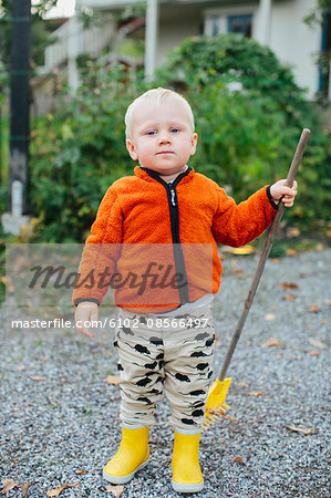 Boy with rake