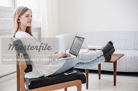 Young woman using laptop