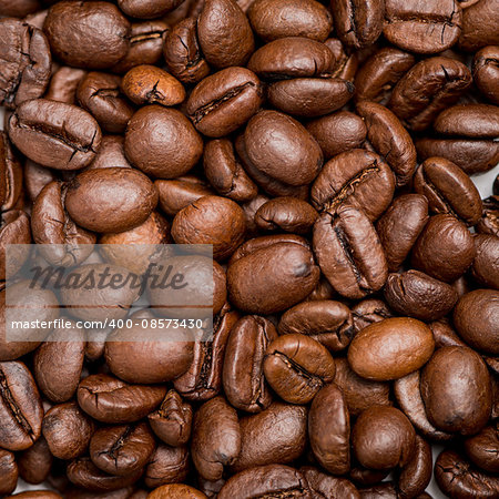 Detailed coffee beans background.