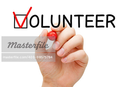 Hand putting check mark with red marker on the tick box in Volunteer form. Volunteerism concept.