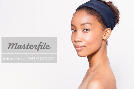 Portrait of young woman wearing headband