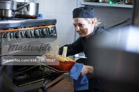 Chef baking in kitchen