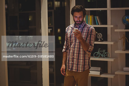 Hipster using smartphone