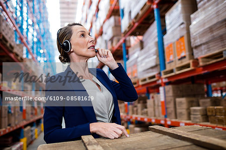 Warehouse manager looking up