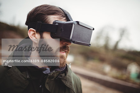 Portrait of hipster man wearing smart glasses