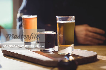 Close up view of shots on wooden table