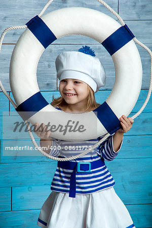 child vest looking through life preserver