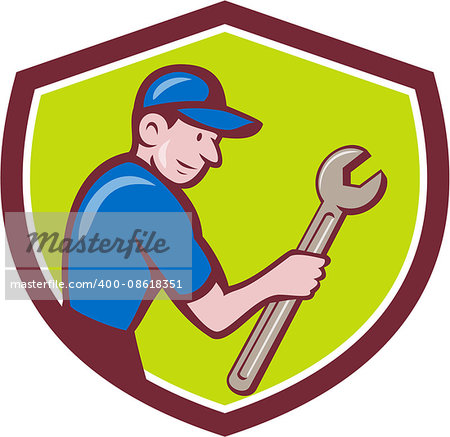 Illustration of a repairman handyman worker wearing hat carrying spanner wrench looking to the side set inside shield crest done in cartoon style.