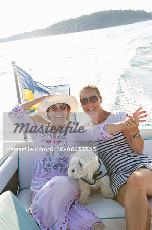 Sweden, Stockholms Skargard, Sodermanland, Jungfrufjarden, Portrait of two mature women on boat