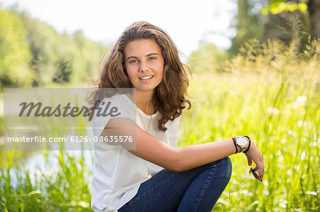 Sweden, Ostergotland, Mjolby, Smiling teenage girl (14-15)