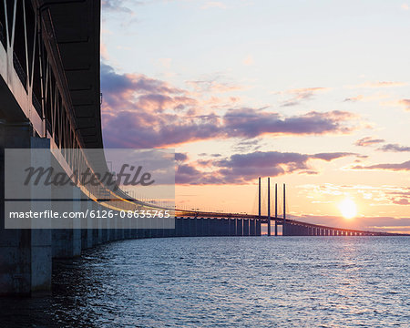 Sweden, Skane, Malmo, Oresund Bridge at sunset