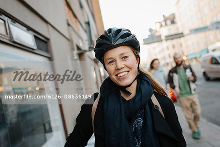 Sweden, Sodermanland, Stockholm, Sodermalm, Portrait of smiling young woman