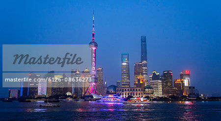 China, Shanghai, Lujiazu,  Financial district with Huangpu river in foreground at night