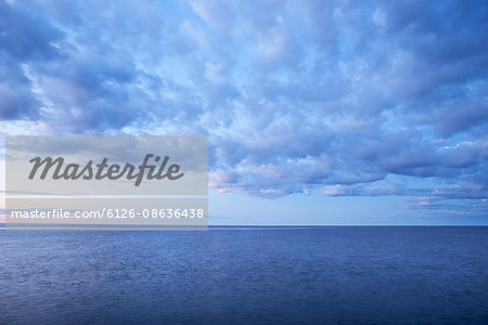 Sweden, Uppland, Baltic Sea, Tranquil sea at dusk