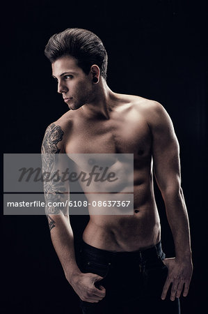 Shirtless young man in profile