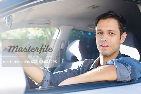 Man enjoying commute in comfortable car