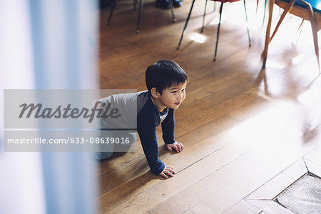 Little boy playing at home