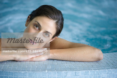 Woman relaxing in jacuzzi, portrait