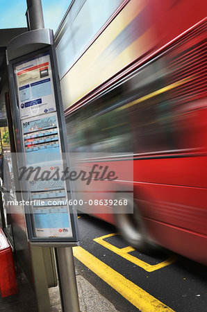 Double Decker Bus Speeding by Schedule, London, England, UK