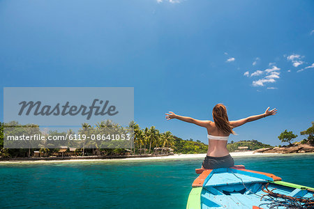 Woman on a traditional Indonesian boat trip to Marak Island near Padang in West Sumatra, Indonesia, Southeast Asia, Asia