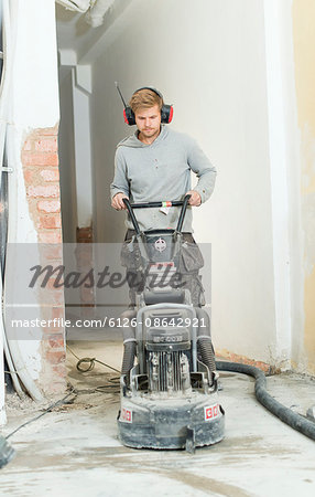 Sweden, Man renovating house