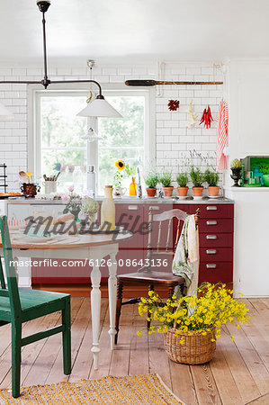 Sweden, Interior of kitchen with dining table